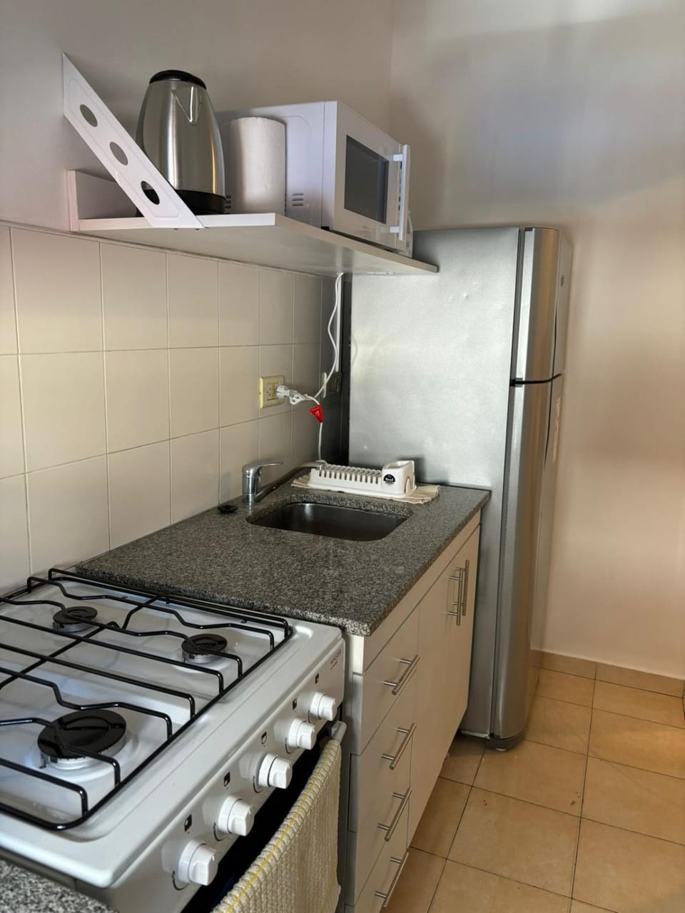 Kitchen or kitchenette, stove