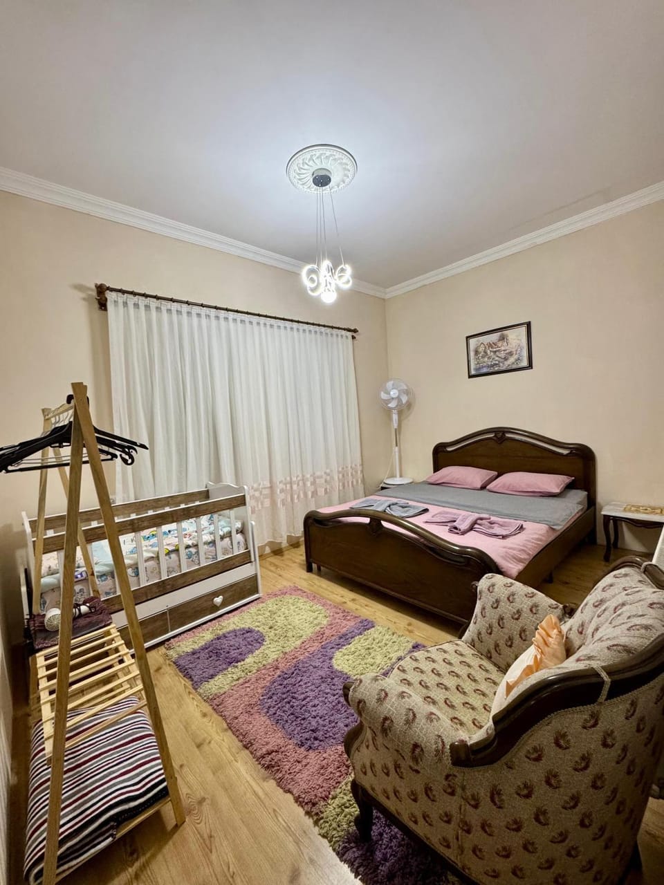 Photo of the whole room, cot