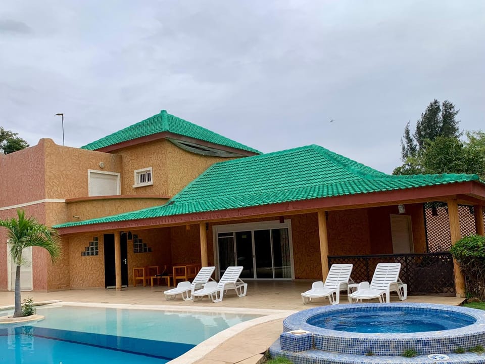 Property building, Patio, Day, Pool view, Swimming pool, sunbed