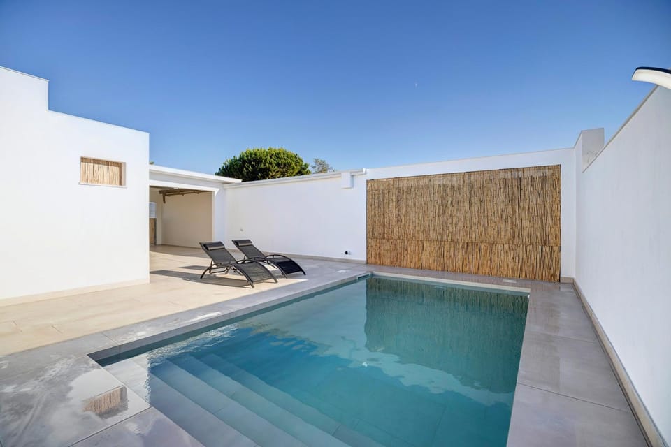 Property building, Living room, Swimming pool