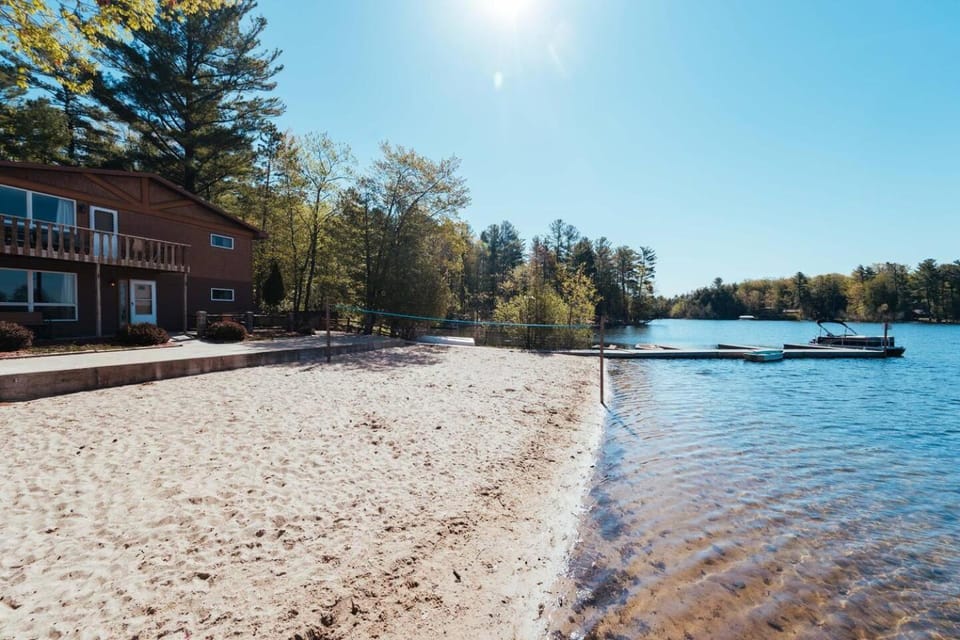 Sandy Beach l Pontoon Rentals l Bonfires l Spider House in Spider Lake