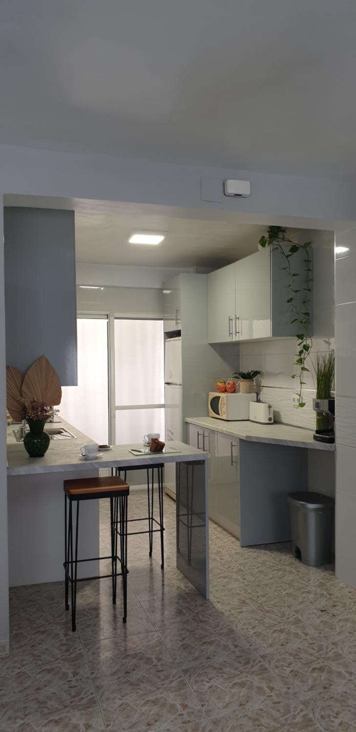 Kitchen or kitchenette, oven, stove