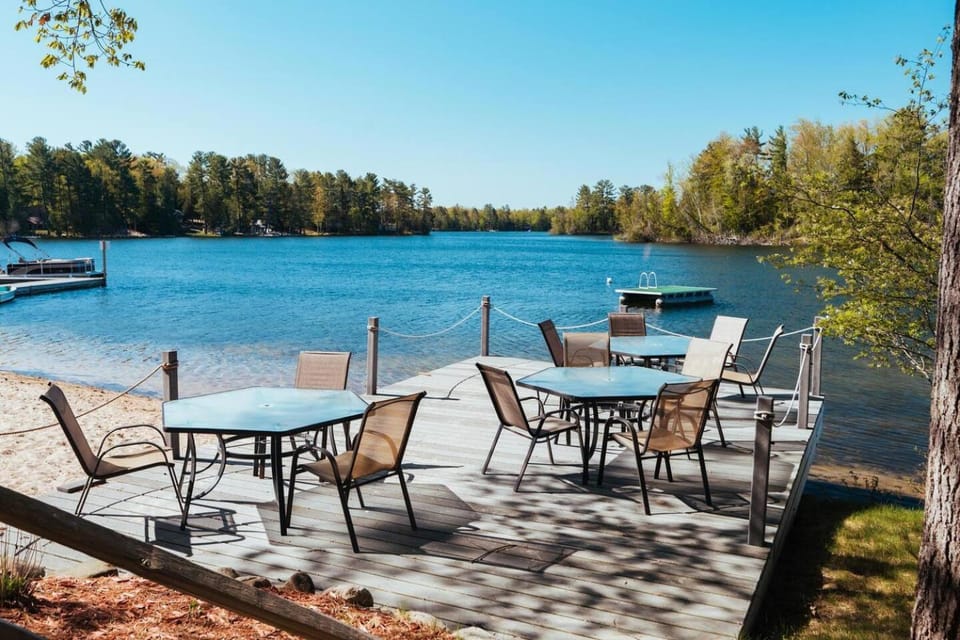 Lakefront l 10mi to TC l Pontoon Rentals l Hot Tub House in Spider Lake