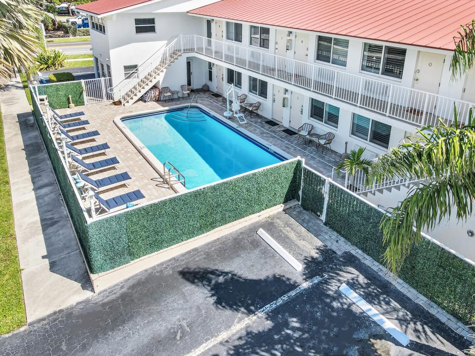 Property building, Pool view, Swimming pool, sunbed