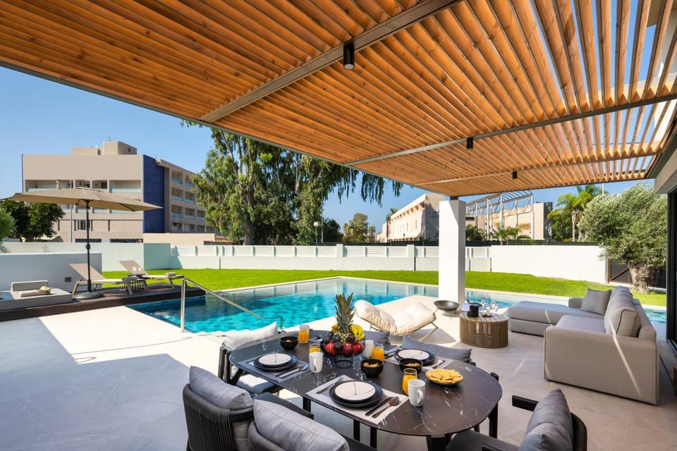 Property building, Patio, Day, Garden, View (from property/room), Balcony/Terrace, Living room, Seating area, Dining area, Garden view, Pool view, Swimming pool, sunbed