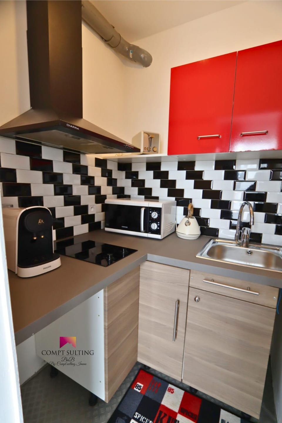 Kitchen or kitchenette, stove, toaster