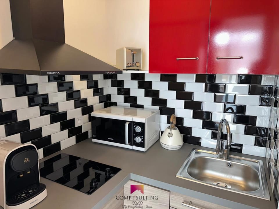 Kitchen or kitchenette, toaster