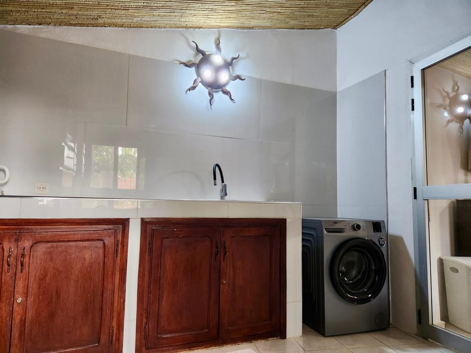 Kitchen or kitchenette, washing machine, dryer
