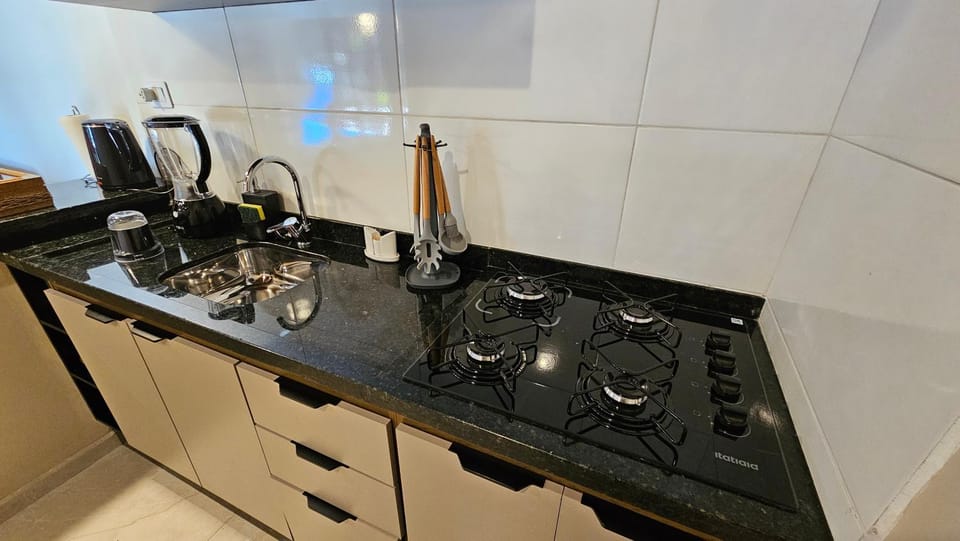 Kitchen or kitchenette, stove