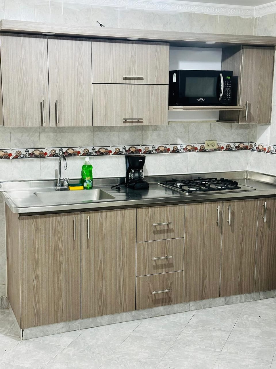 Kitchen or kitchenette, dishwasher, stove