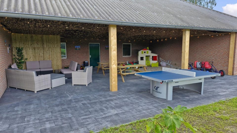 Patio, Communal lounge/ TV room, Day, Children play ground, Table tennis, Table tennis