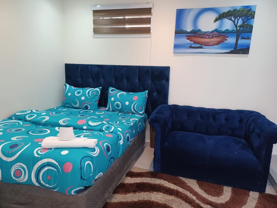 Bed, Living room, Seating area
