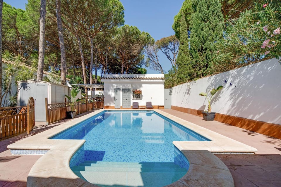 Property building, Living room, Swimming pool