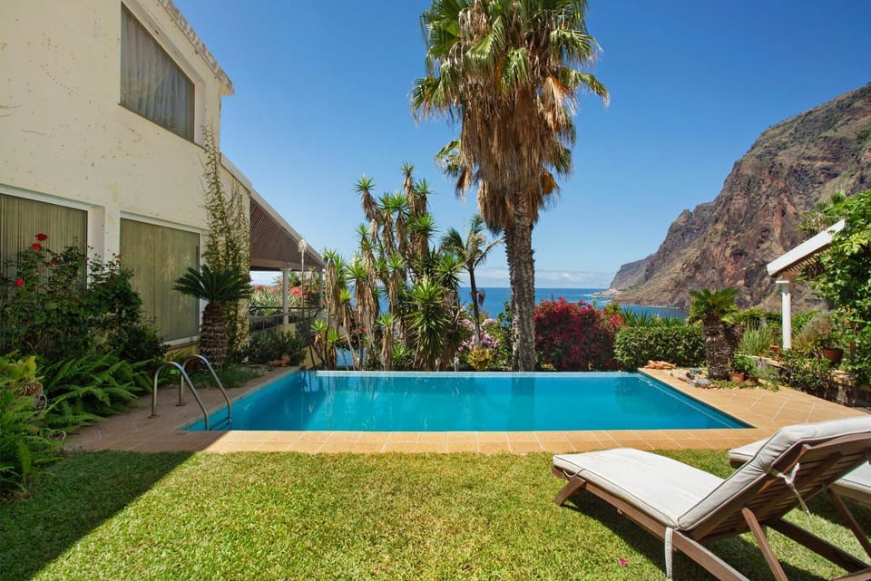 Property building, Living room, Swimming pool