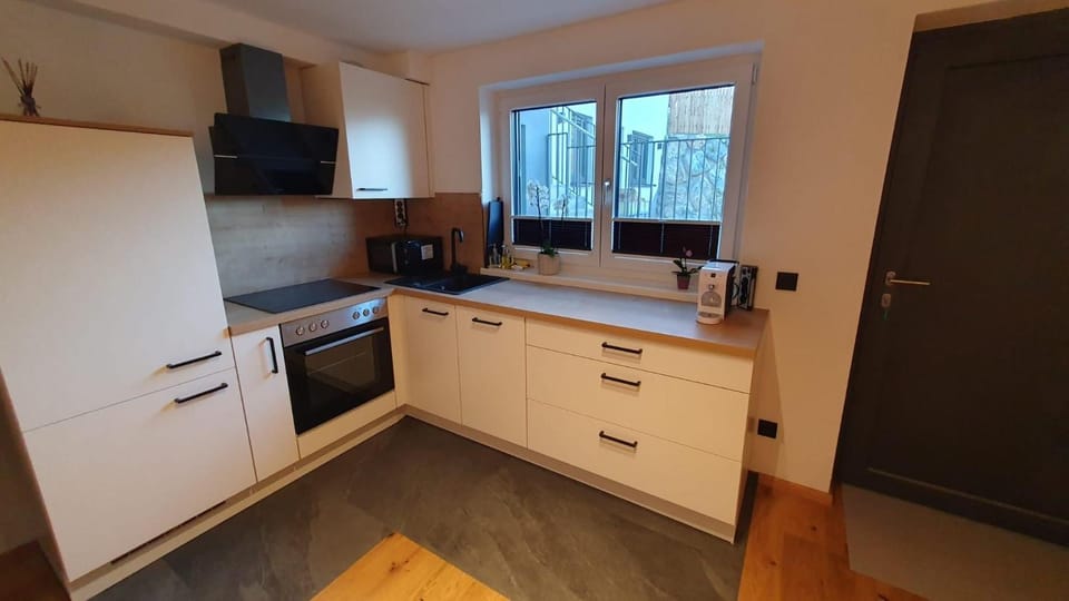 Kitchen or kitchenette, oven, stove