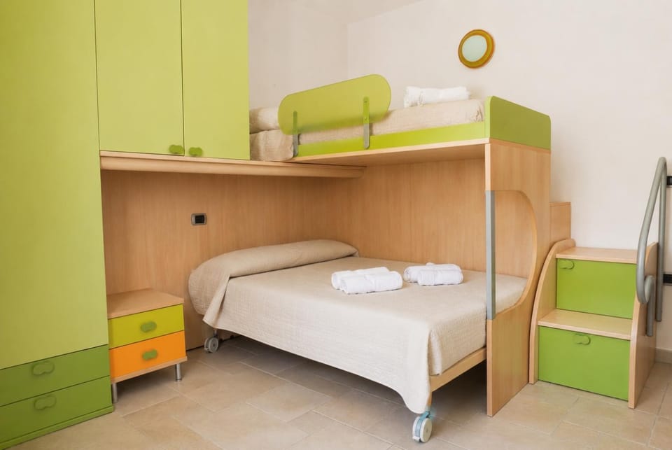 Bed, Photo of the whole room, Bedroom, bunk bed, towels, wardrobe