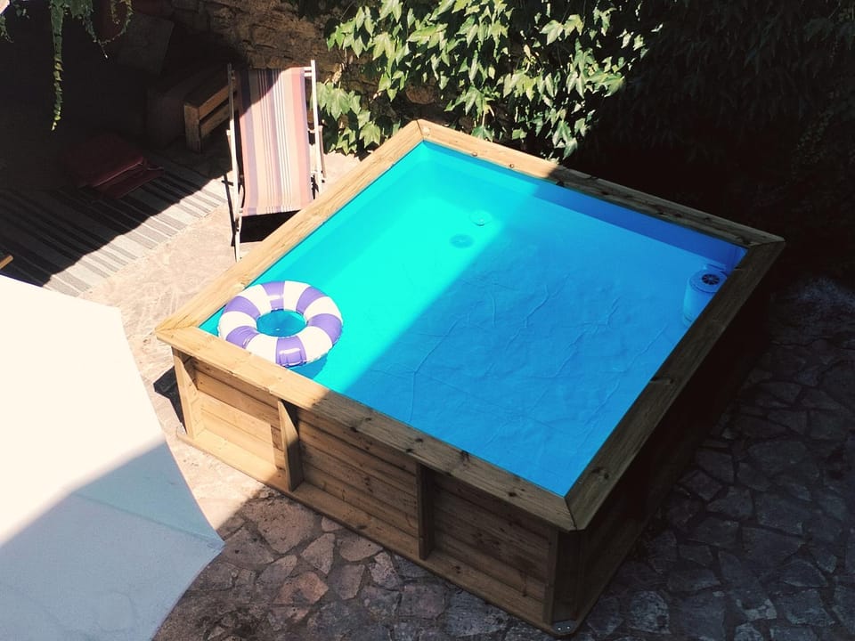 Property building, Living room, Swimming pool