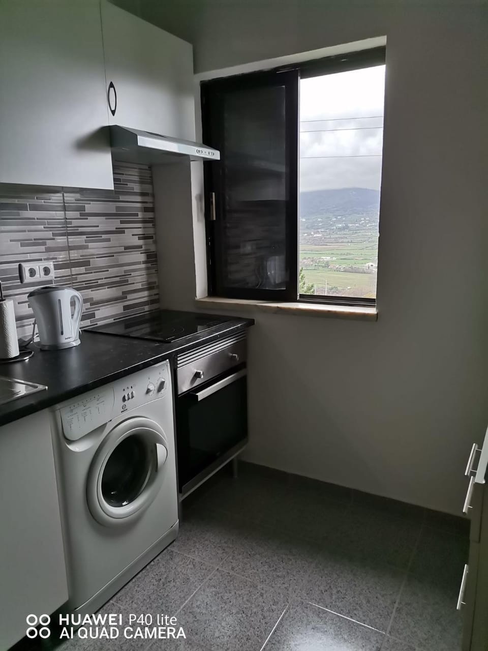 Kitchen or kitchenette, dishwasher, stove, washing machine
