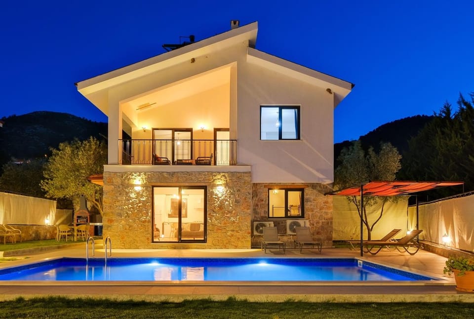 Property building, Patio, Night, Pool view, Swimming pool