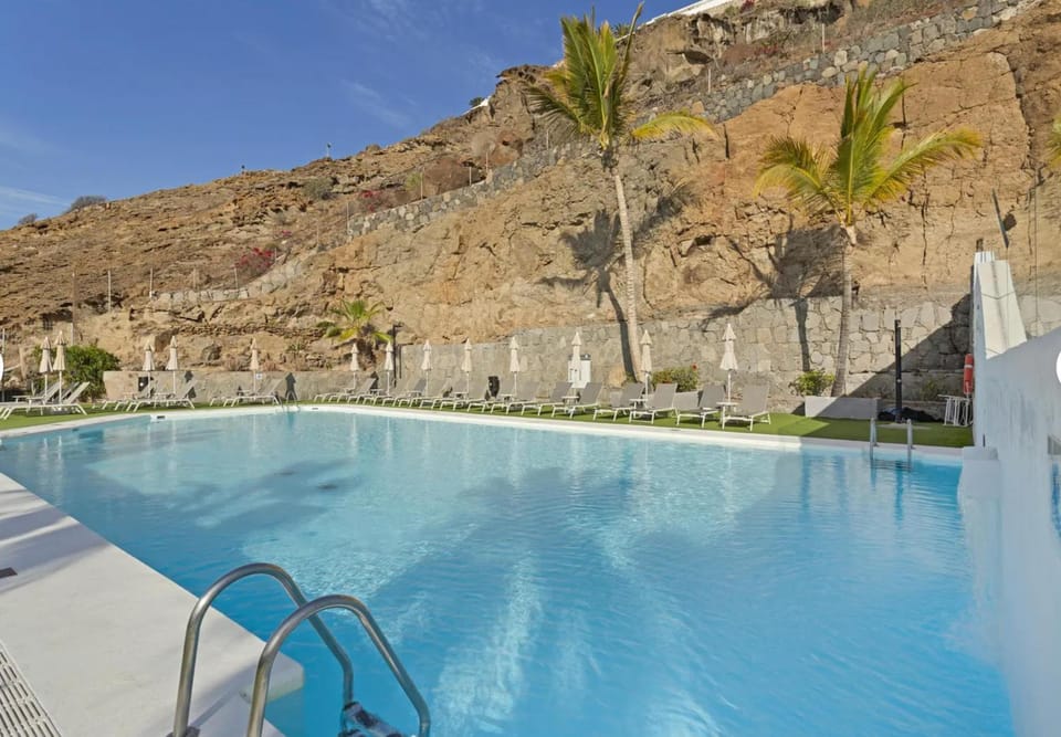 Property building, Living room, Swimming pool