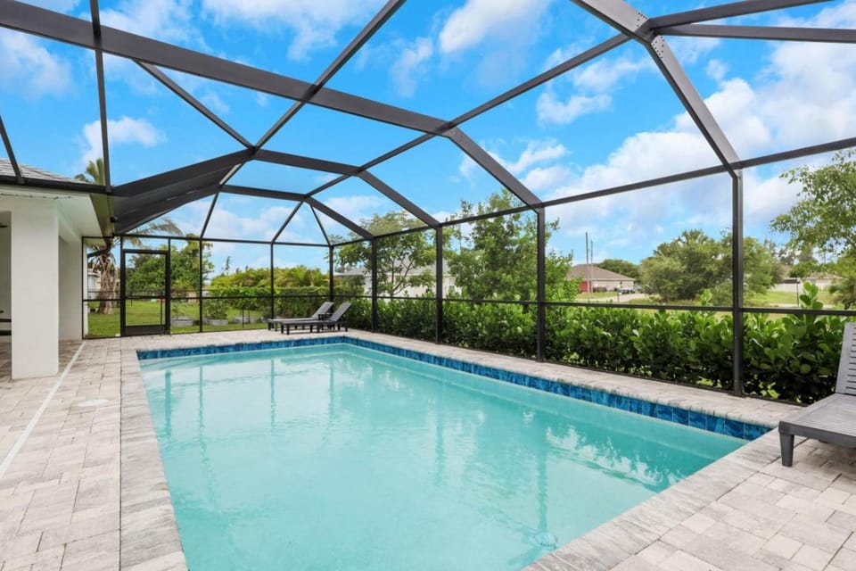 New Build With Heated Pool! Perfect for 2 families! House in Cape Coral