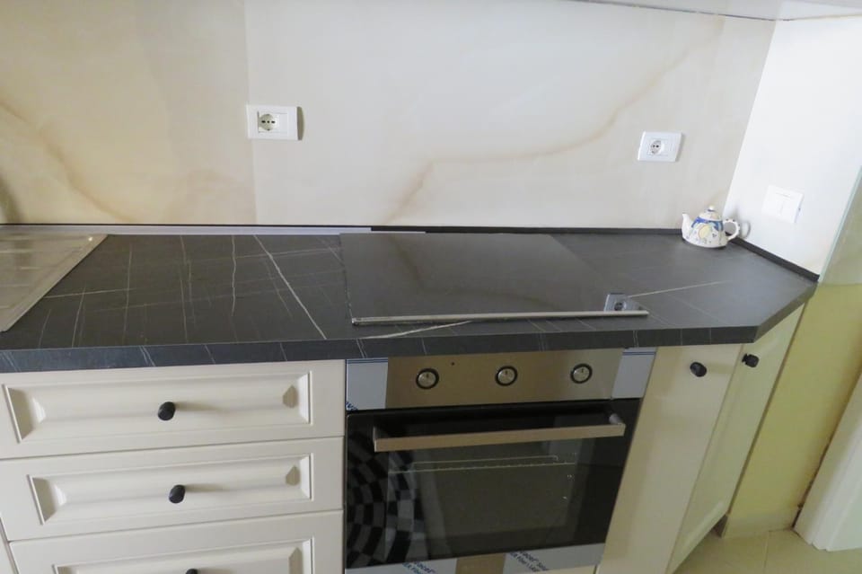 Kitchen or kitchenette, stove, kitchen