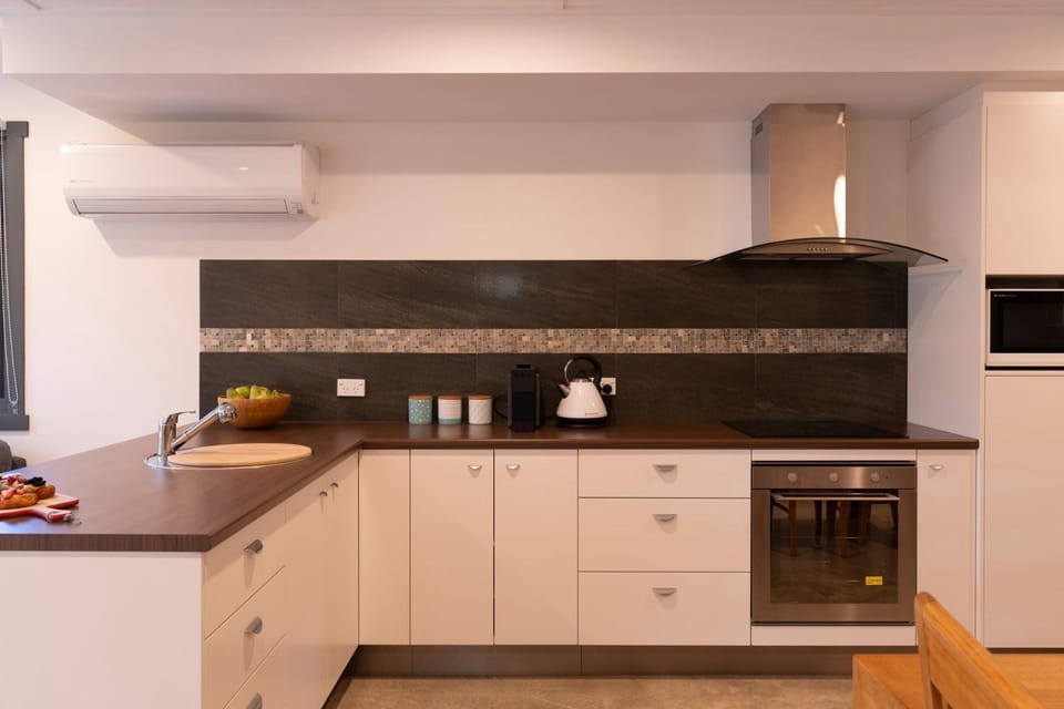 Kitchen or kitchenette, stove, toaster