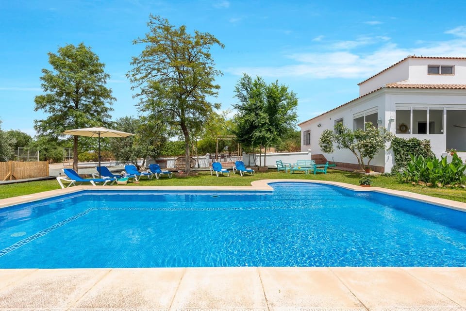 Property building, Living room, Swimming pool