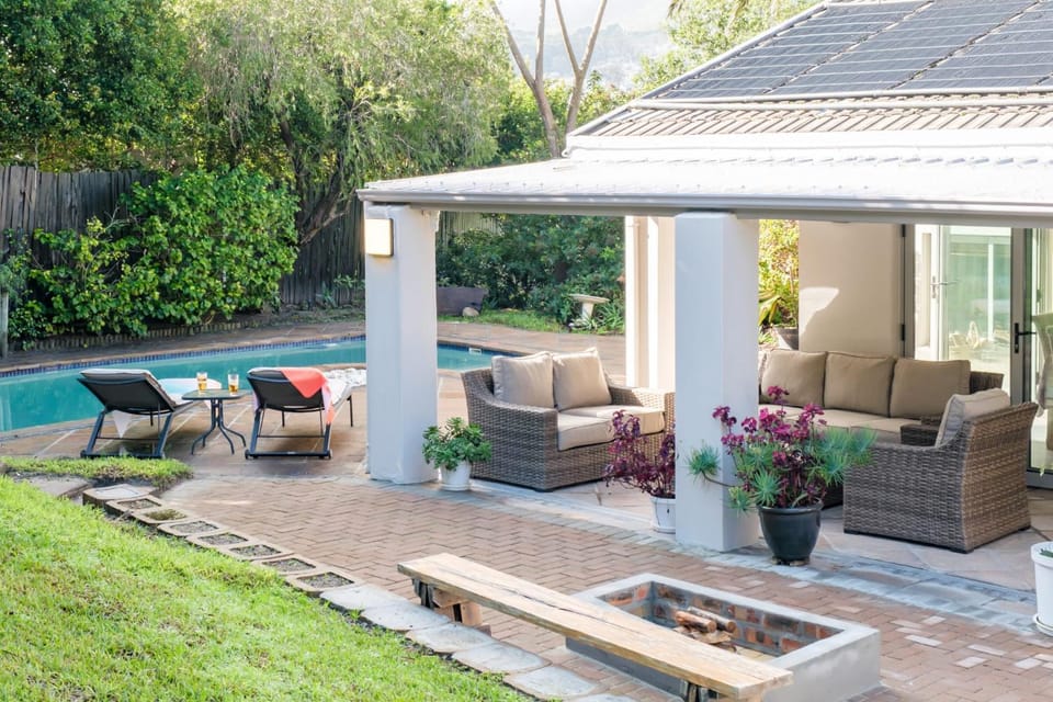 Property building, Patio, Garden, Seating area, Garden view, Pool view, Swimming pool, sunbed