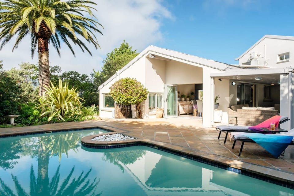 Property building, Patio, Garden, Seating area, Garden view, Swimming pool, sunbed