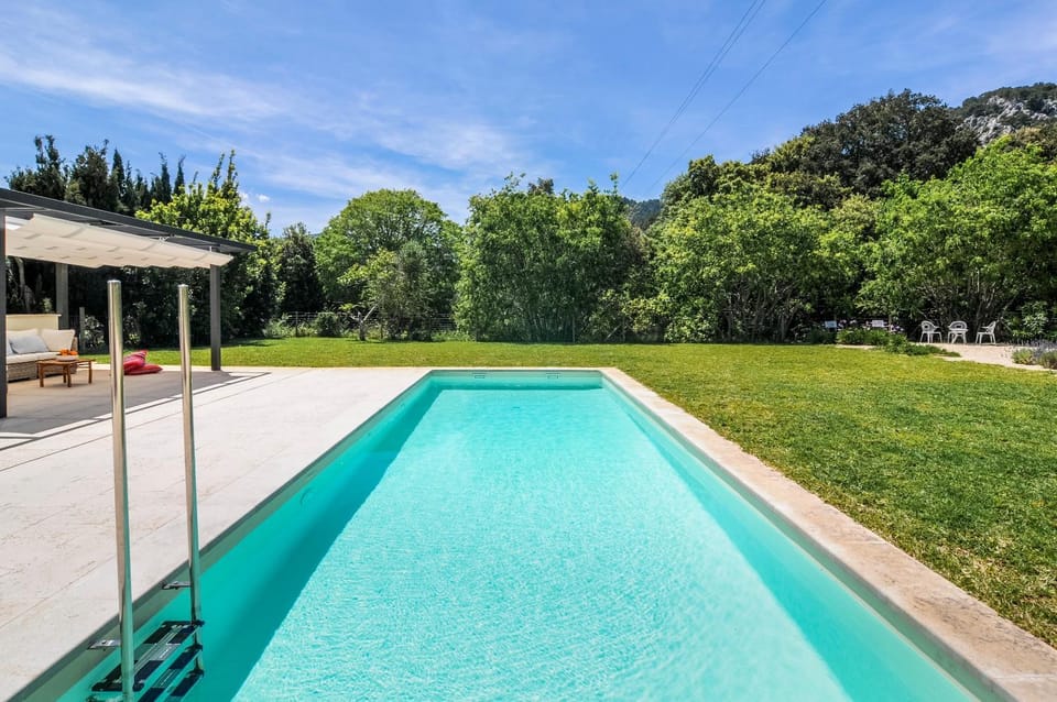 Property building, Living room, Swimming pool