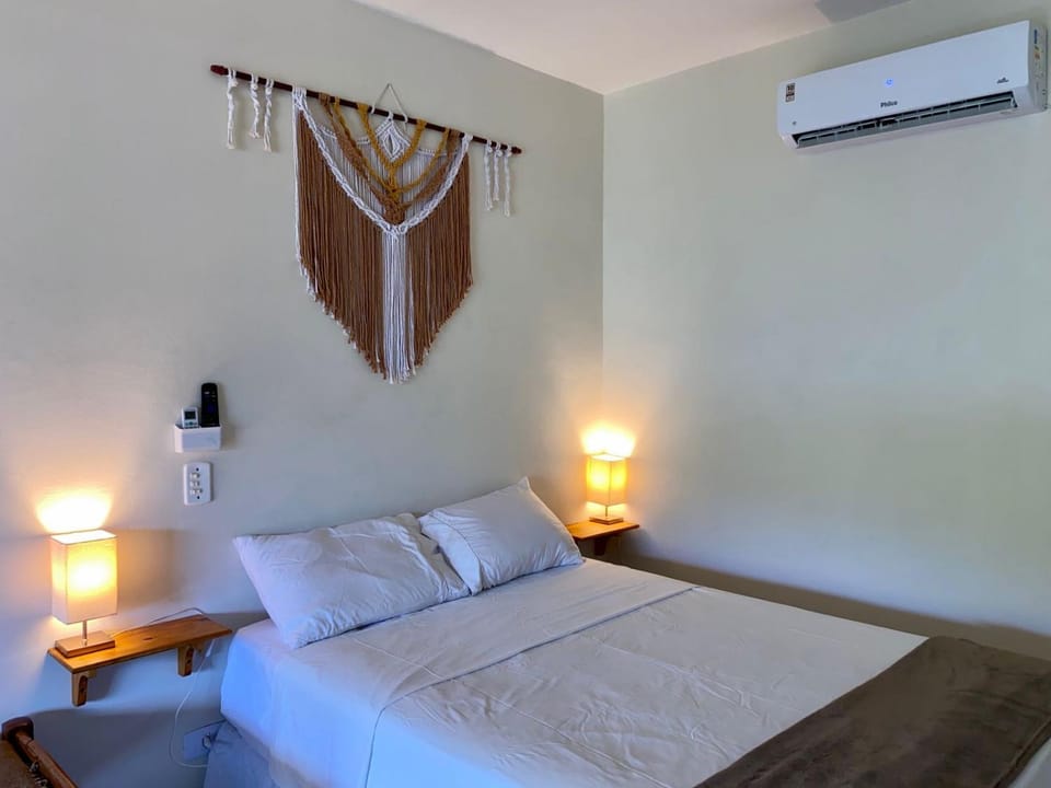 Apartamento completo com Ar, Vaga e Wifi, 2km da balsa Apartment in Ilhabela