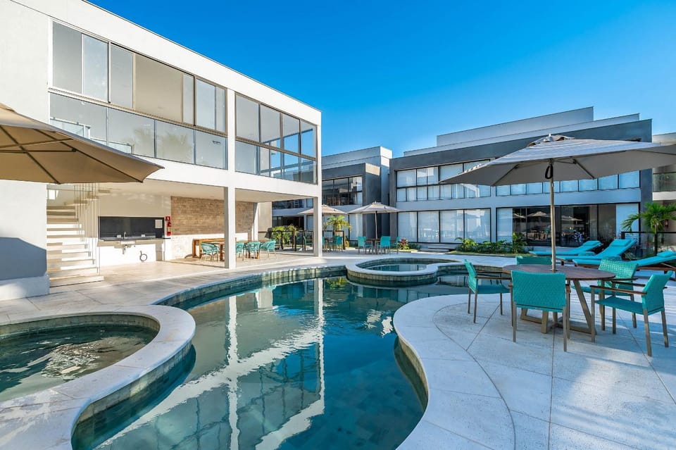 Property building, Day, Pool view, Swimming pool, sunbed
