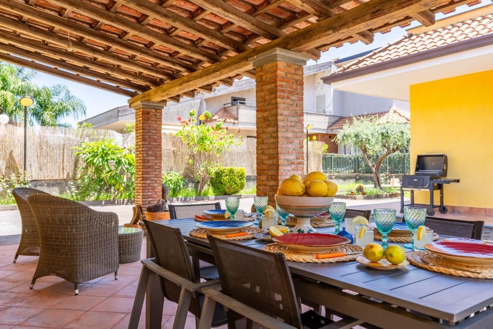 Patio, Day, BBQ facilities, Dining area
