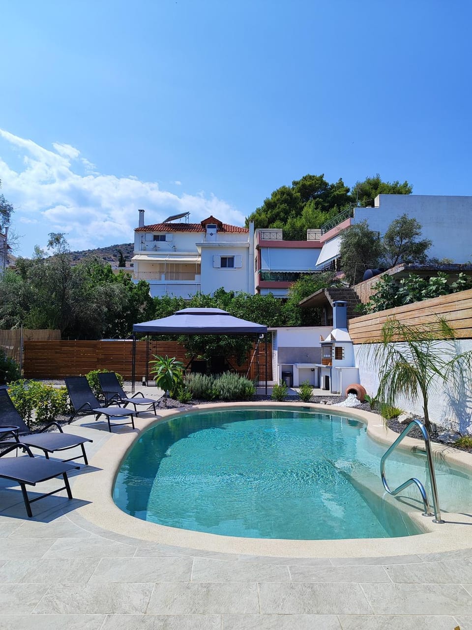 Property building, Patio, Day, Natural landscape, Garden, Garden view, Pool view, Swimming pool, sunbed