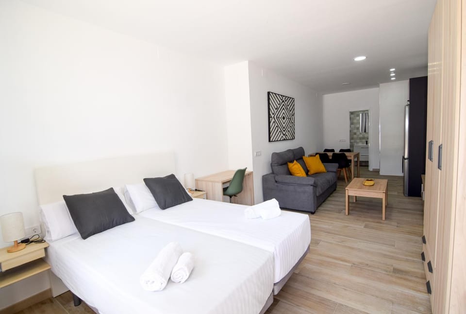 Bed, Living room, Seating area, Bedroom
