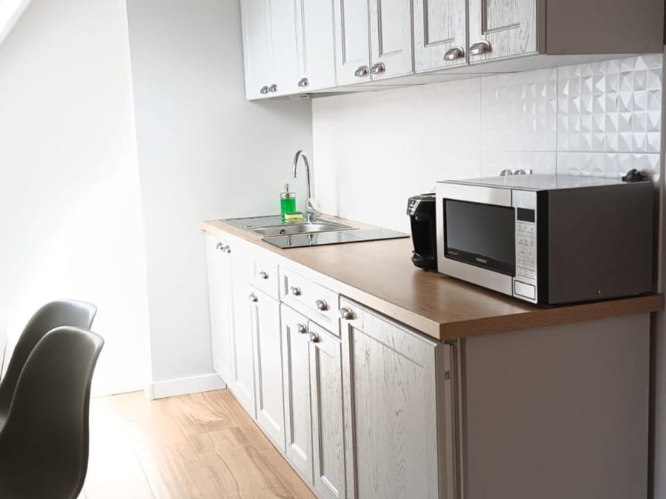 Kitchen or kitchenette, stove