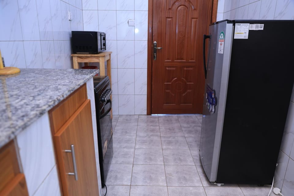 Kitchen or kitchenette, oven, stove