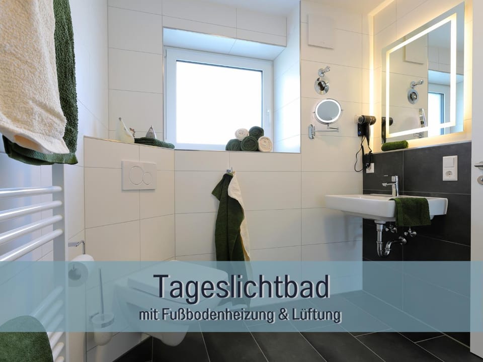 Toilet, Bathroom, hair dryier, towels, towels