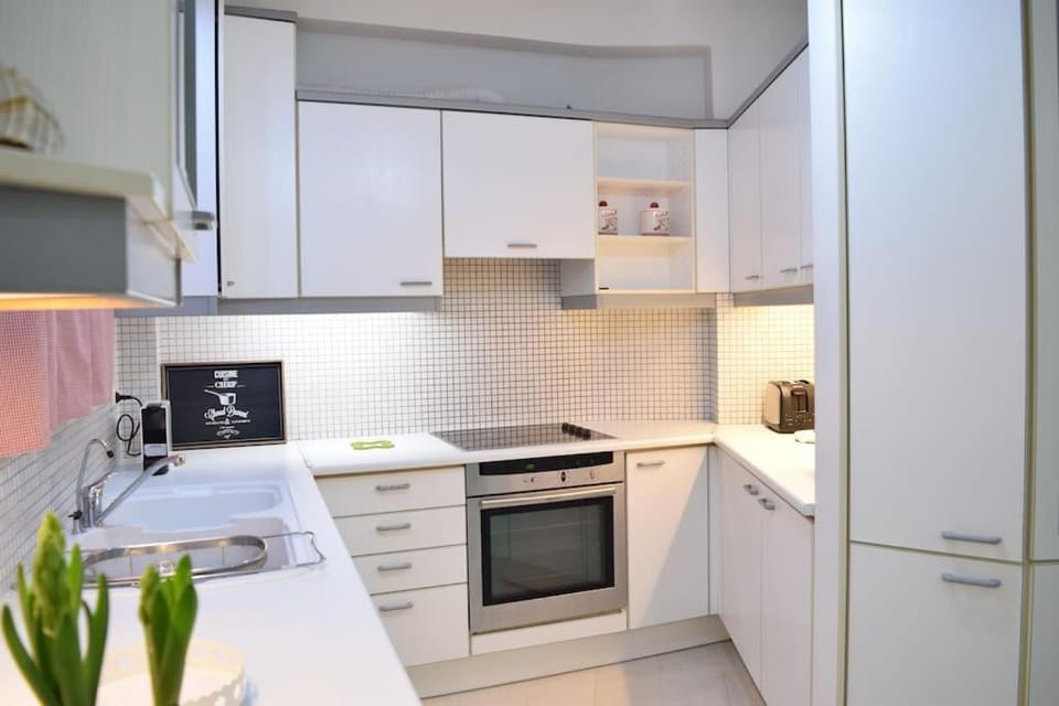 Kitchen or kitchenette, dishwasher, oven, stove, toaster