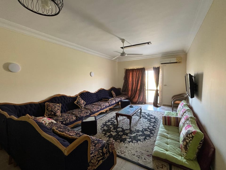 TV and multimedia, Living room, Seating area, fireplace, air conditioner