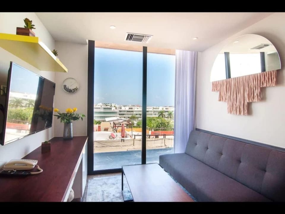 View (from property/room), Balcony/Terrace, Living room, Seating area, air conditioner