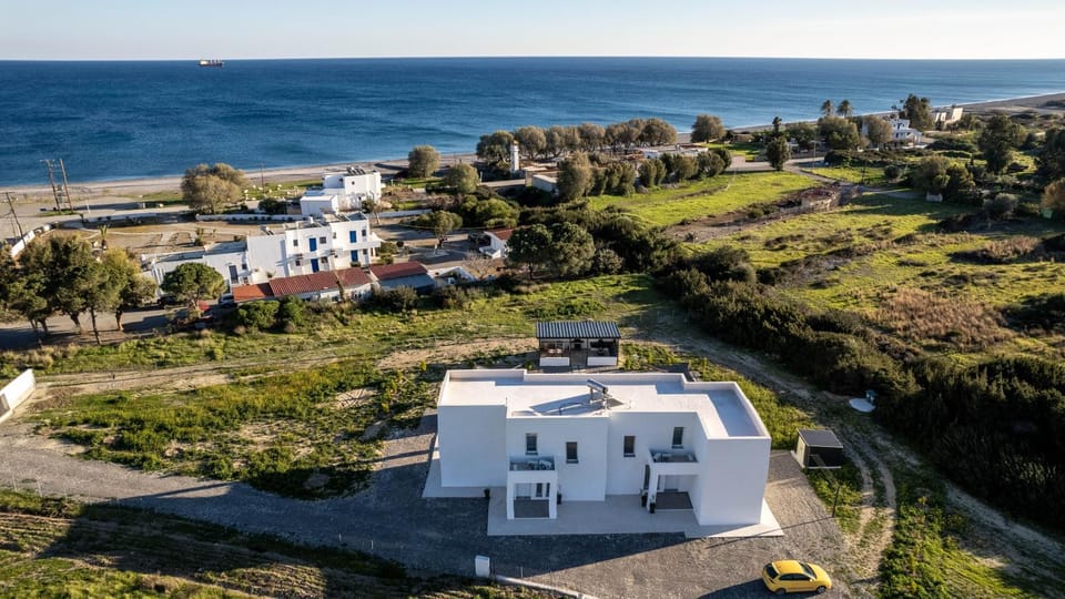 Property building, Nearby landmark, Day, Natural landscape, Bird's eye view, Beach, Beach, Sea view