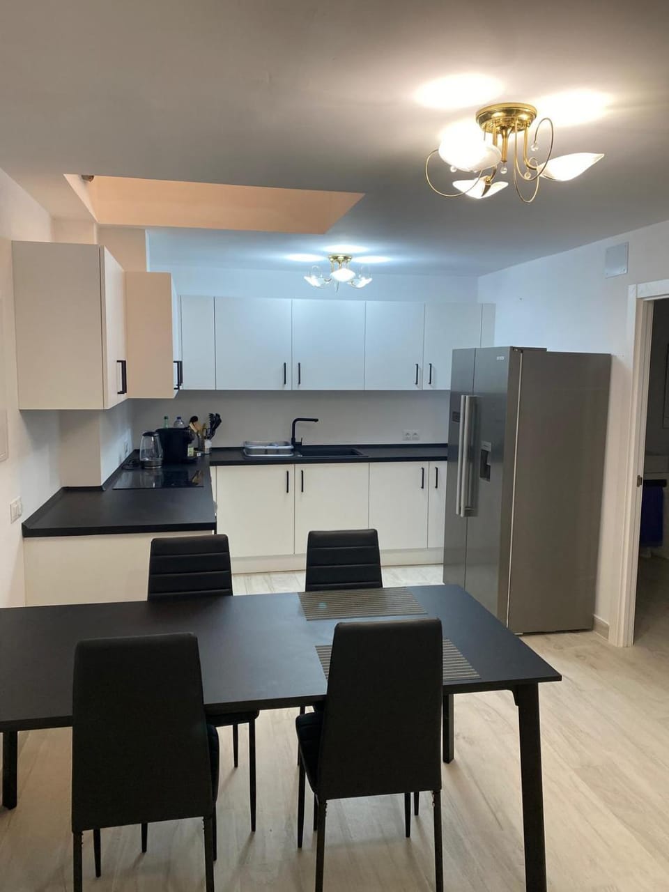 Dining area, minibar, oven, stove
