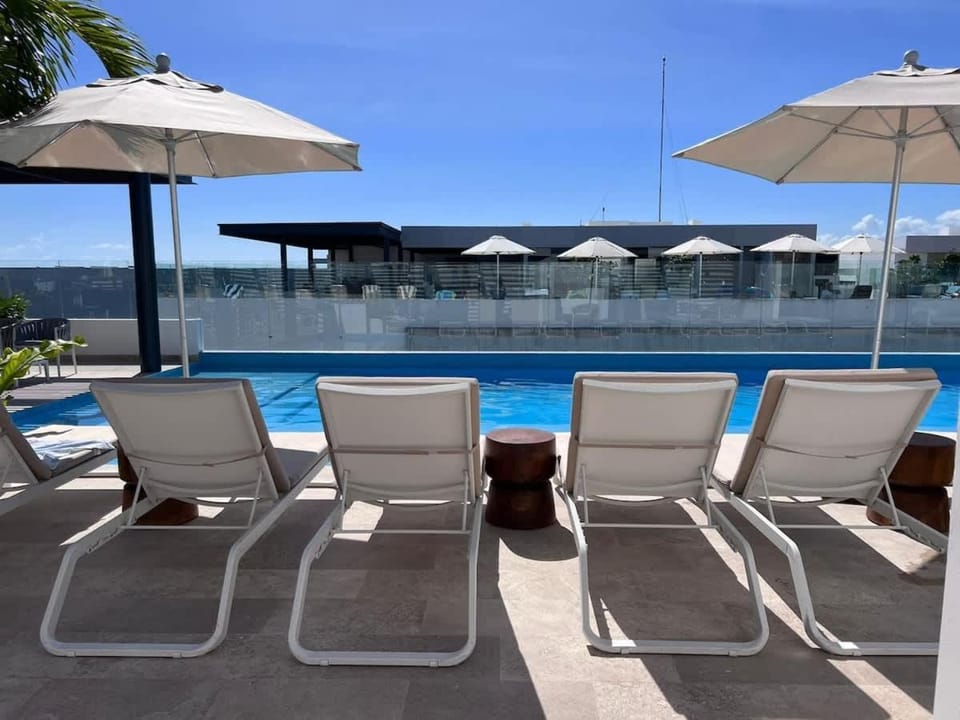 View (from property/room), Balcony/Terrace, Pool view, Swimming pool, sunbed