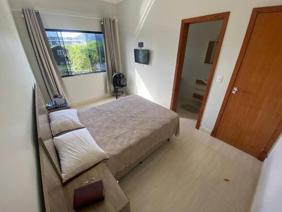 Casa 200m da praia, 8 pessoas, piso superior Apartment in Bombinhas
