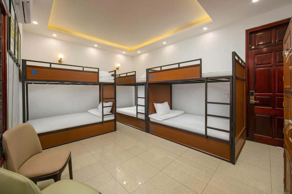 Bed, Living room, Seating area, Bedroom, bunk bed, wardrobe, air conditioner