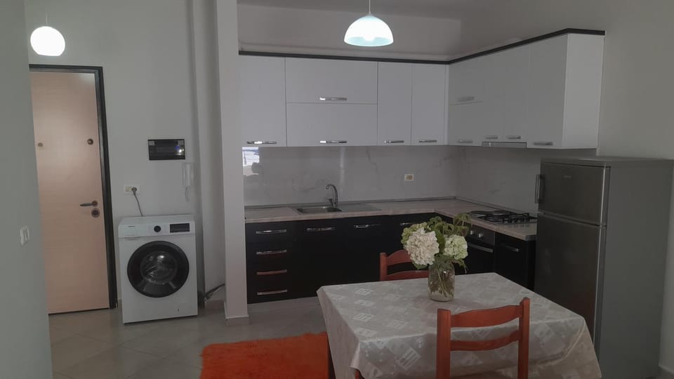 Kitchen or kitchenette, washing machine