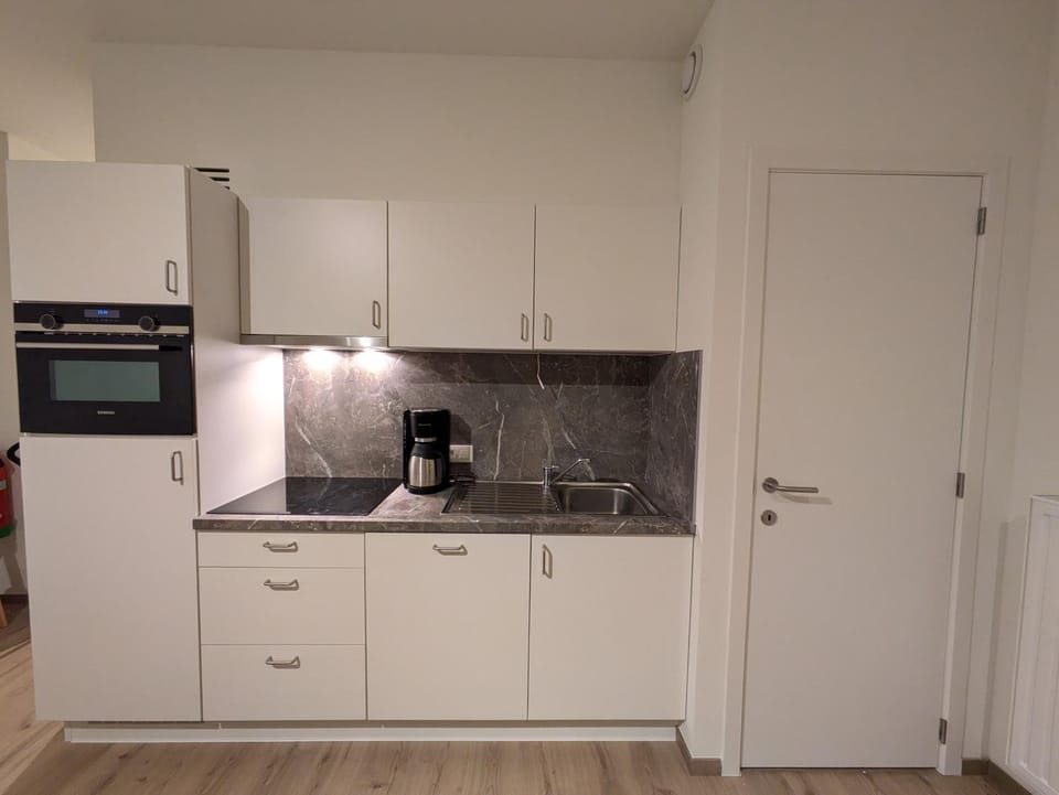 Kitchen or kitchenette, oven, stove