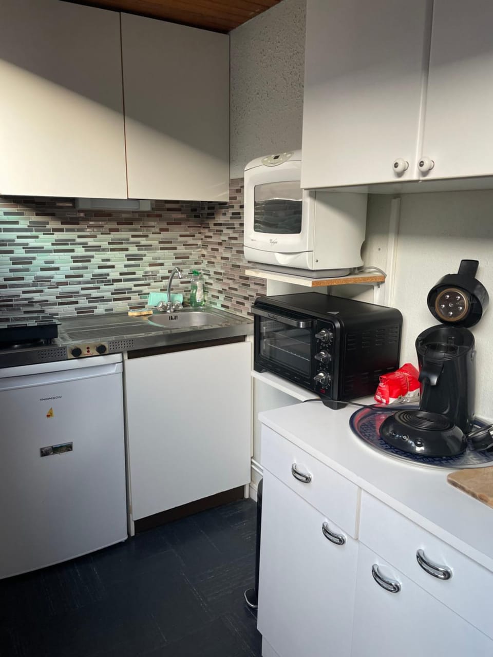Kitchen or kitchenette, stove